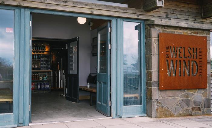 The open front door at In the Welsh Wind Distillery, Tanygroes, Cardigan Ceredigion west Wales